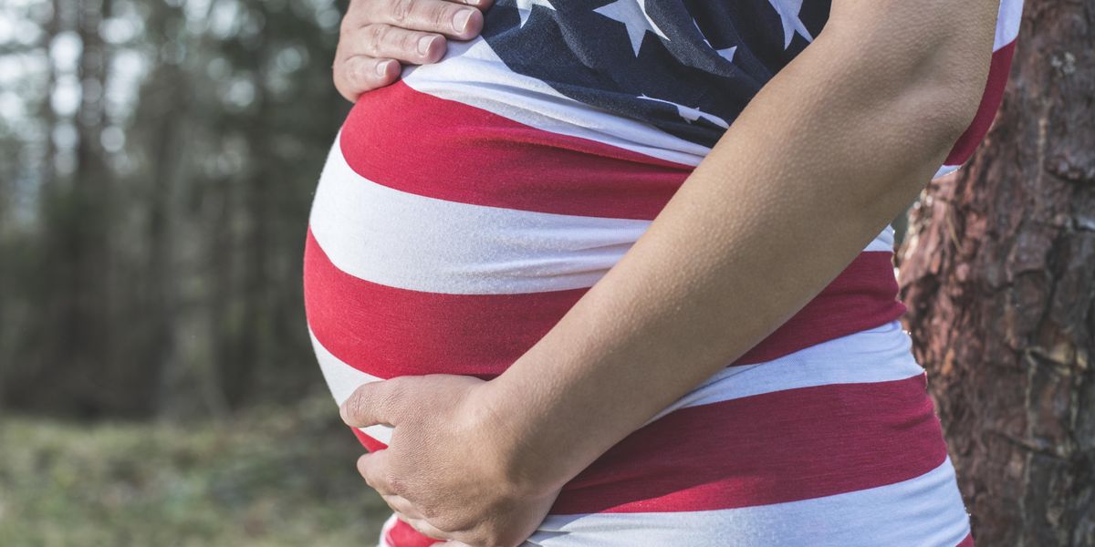 Pregnant woman with American flag clothing