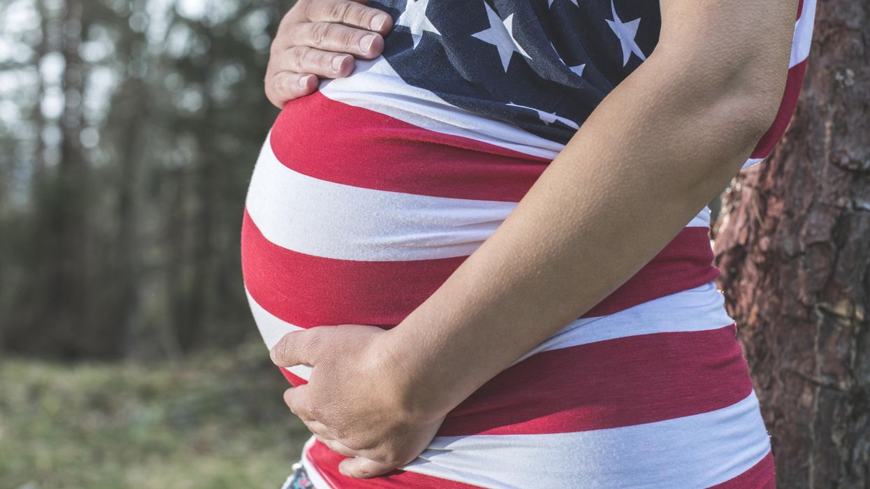Pregnant woman with American flag clothing