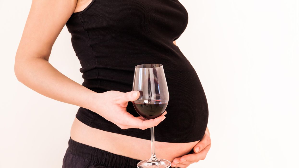pregnant woman with wine
