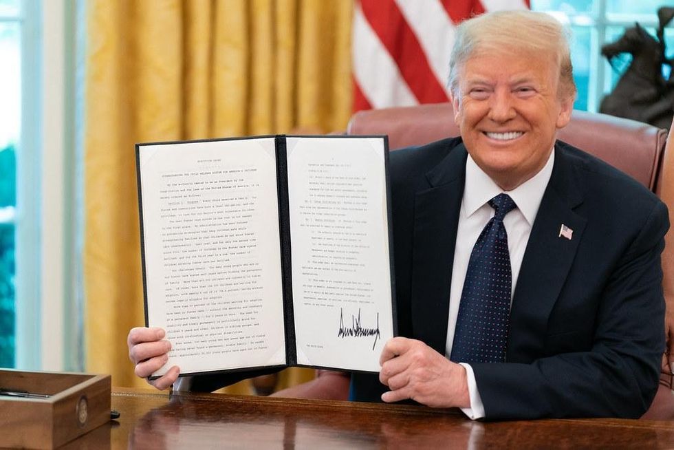 President Donald J. Trump signing an executive order on June 24, 2020.