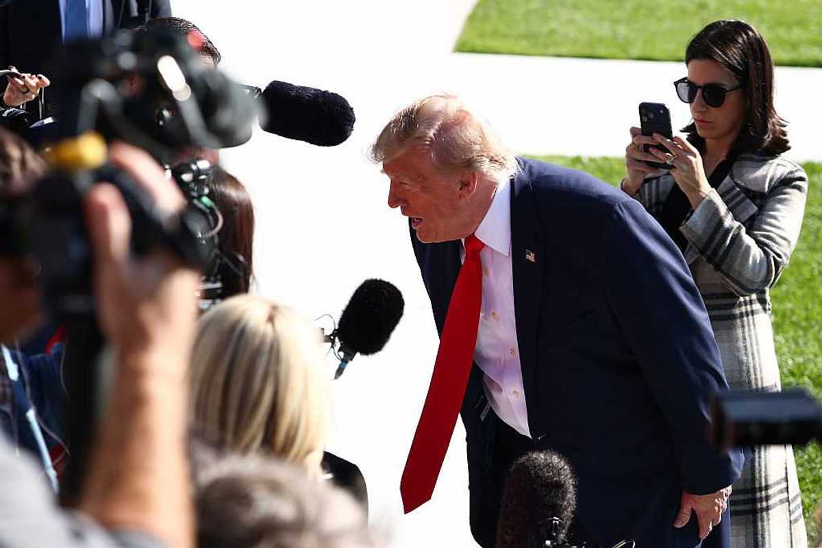 President Donald Trump speaks to members of the media