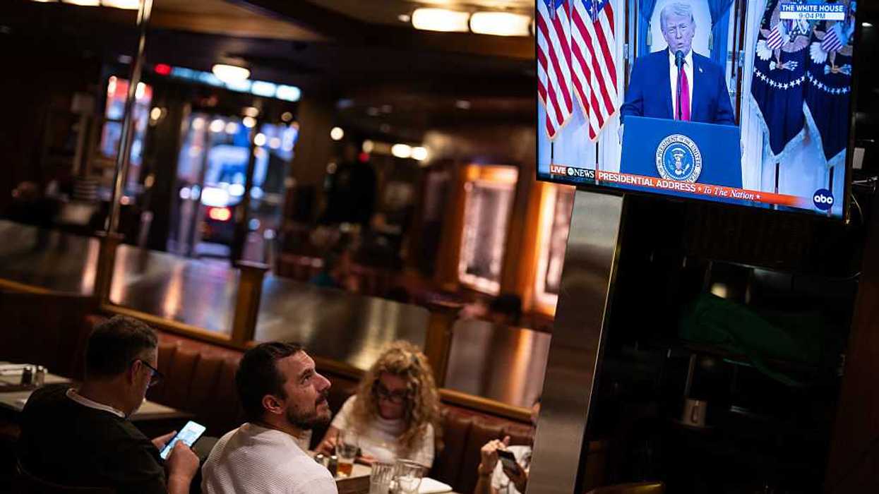 President's Trump National Address On Iran Is Watched By New Yorkers In Manhattan