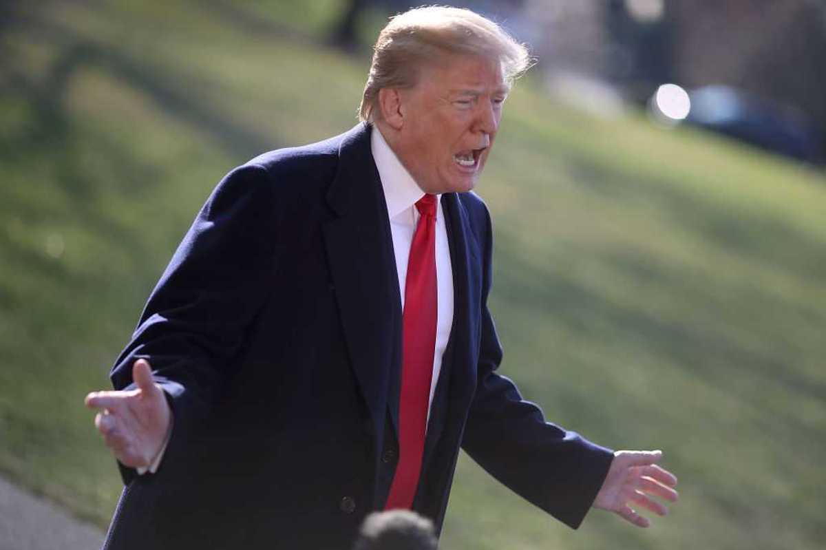 President Trump standing outside.