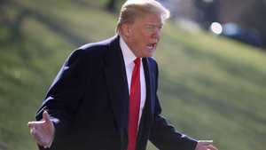 President Trump standing outside.