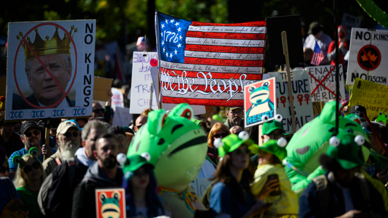 Protest Demonstrators holding up signs.