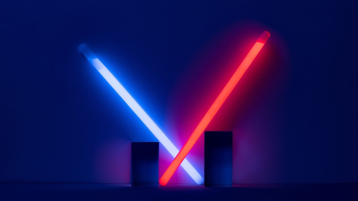 Red and blue glow sticks crossing