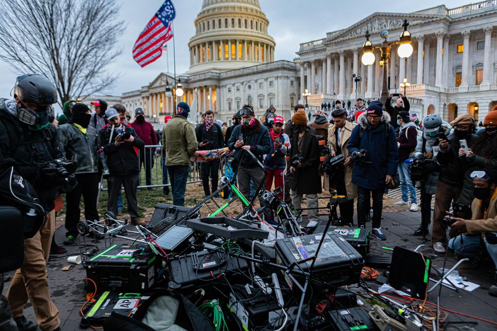 Rioters destroy media equipment