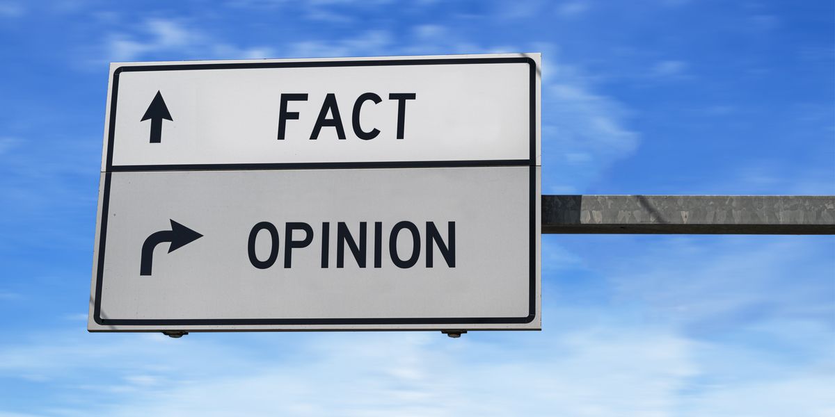 Road sign with options for Fact and Opinion
