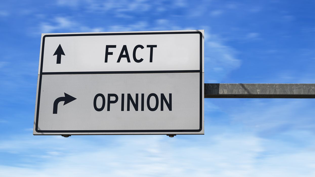 Road sign with options for Fact and Opinion