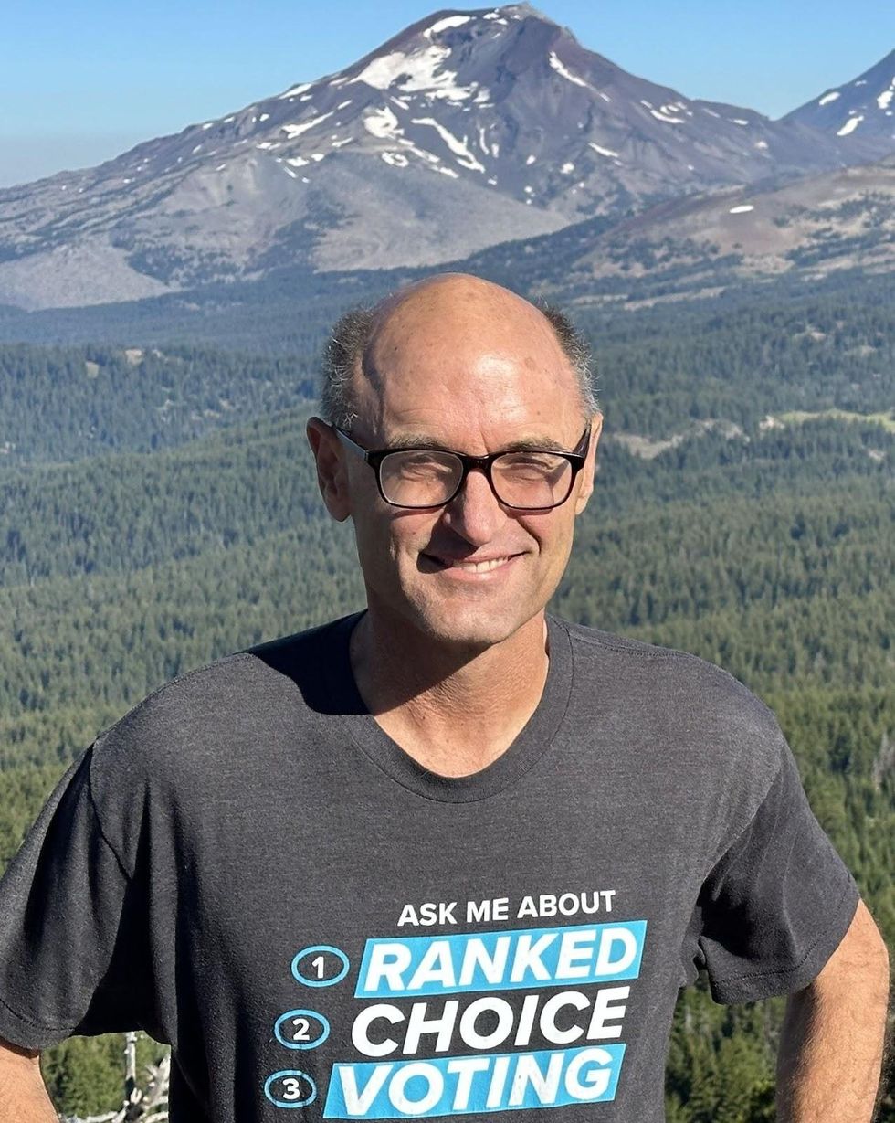 Rob Richie hiking in Oregon in 2023