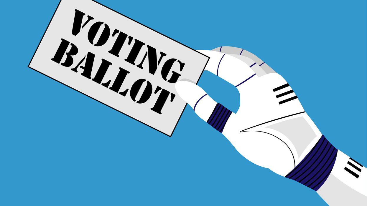 Robotic hand holding a ballot