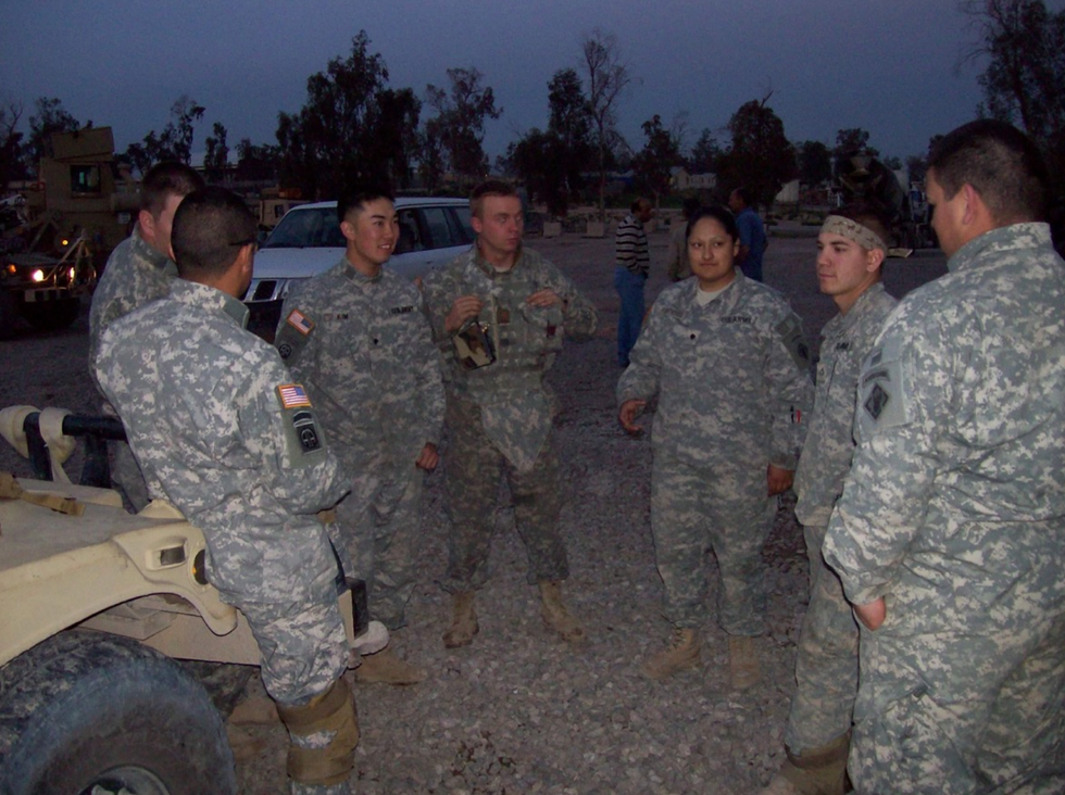 Roseanne Rodriguez with her unit while deployed in Mosul, Iraq