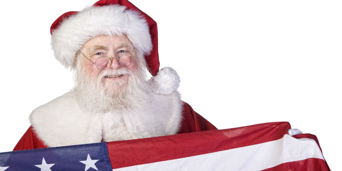 Santa Claus holding an American flag