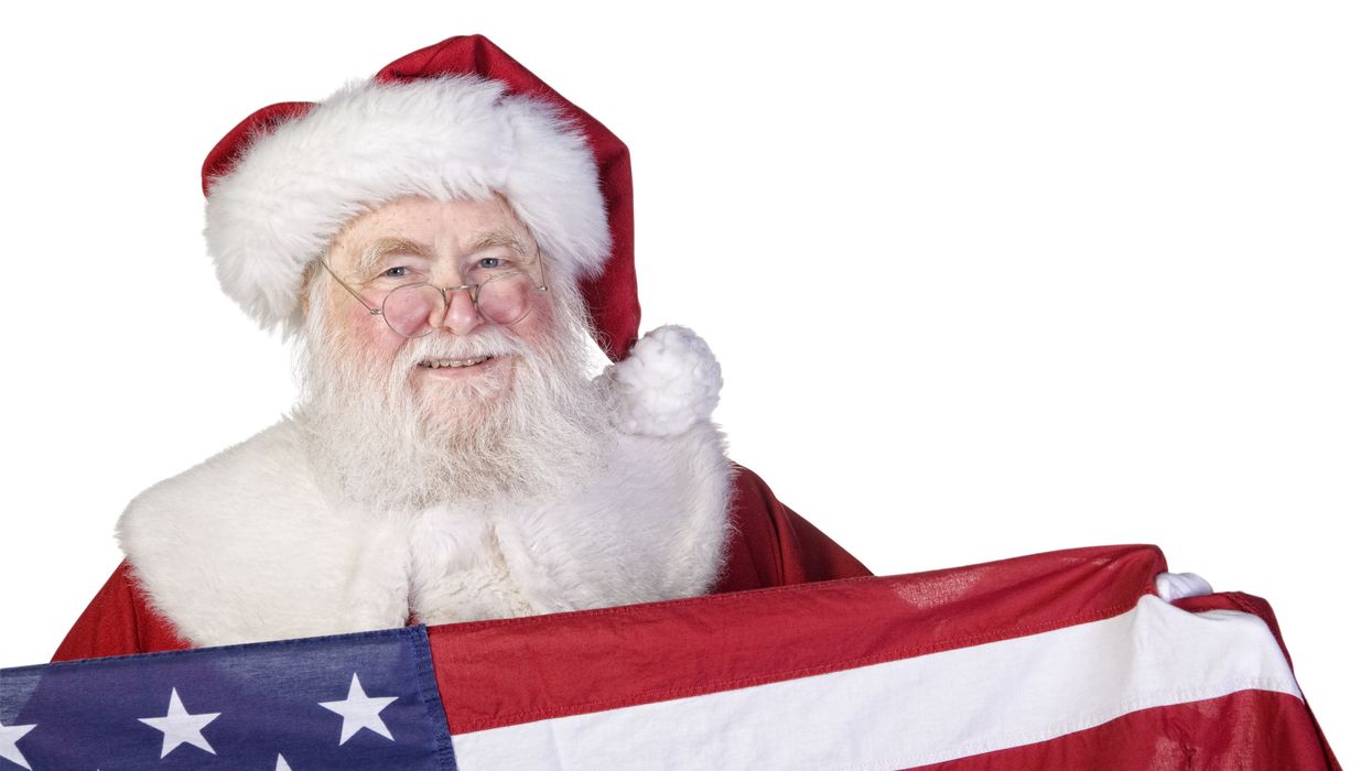 Santa Claus holding an American flag