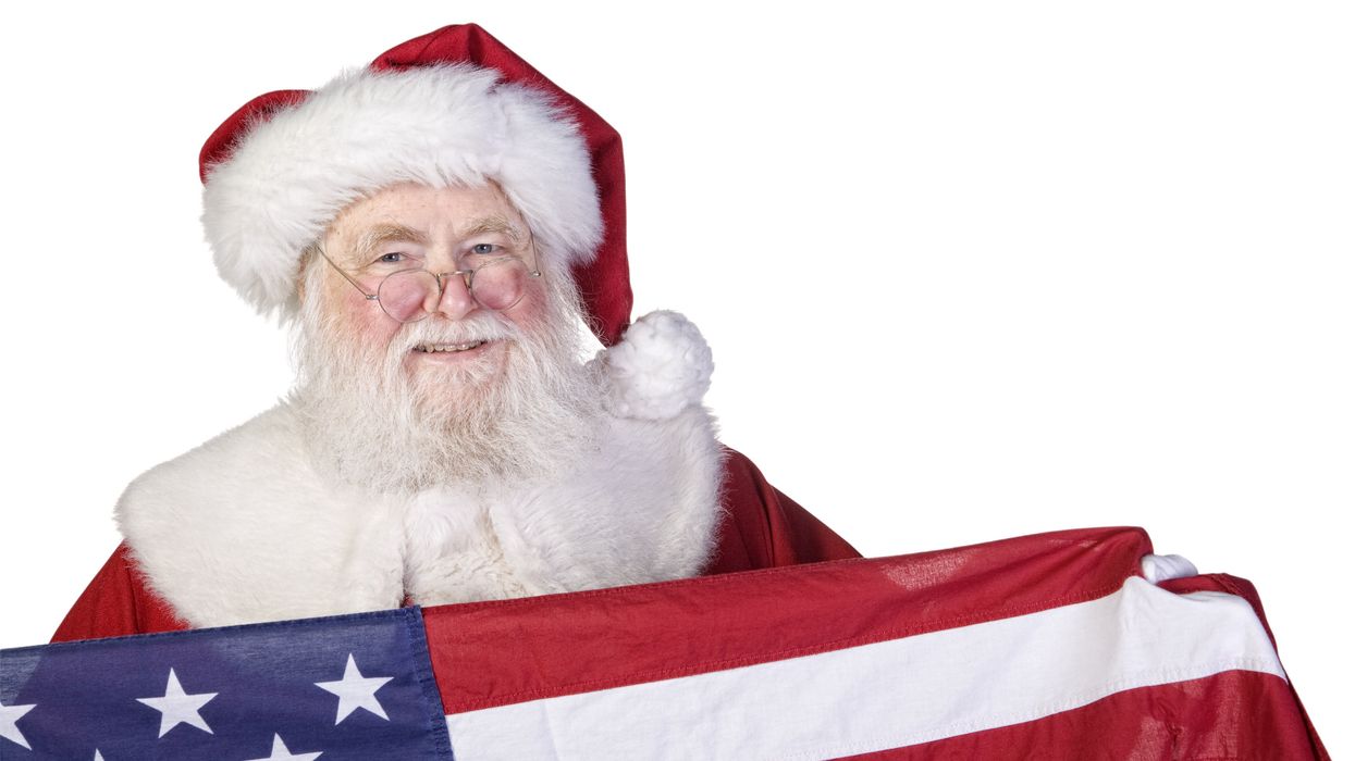 Santa Claus holding an American flag