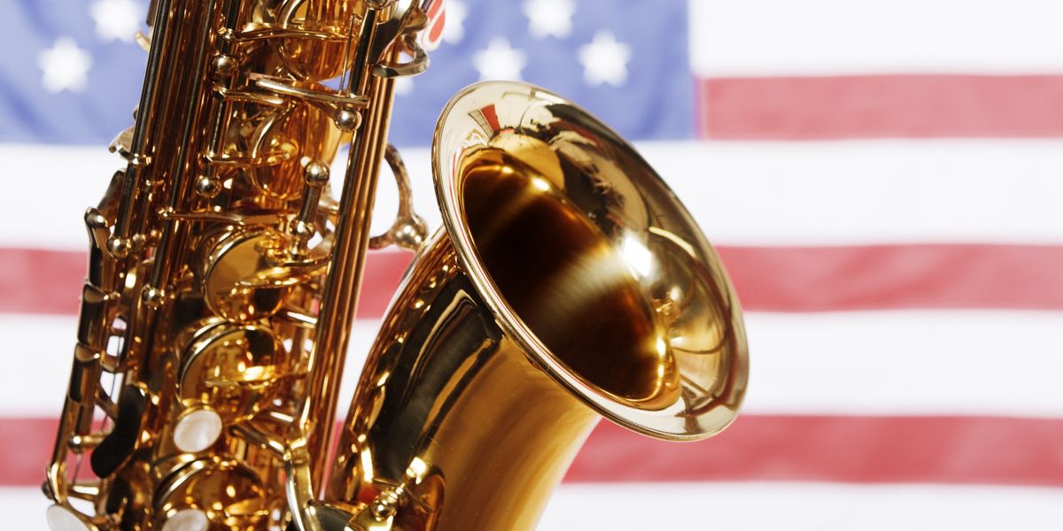 Saxophone over an American flag backdrop