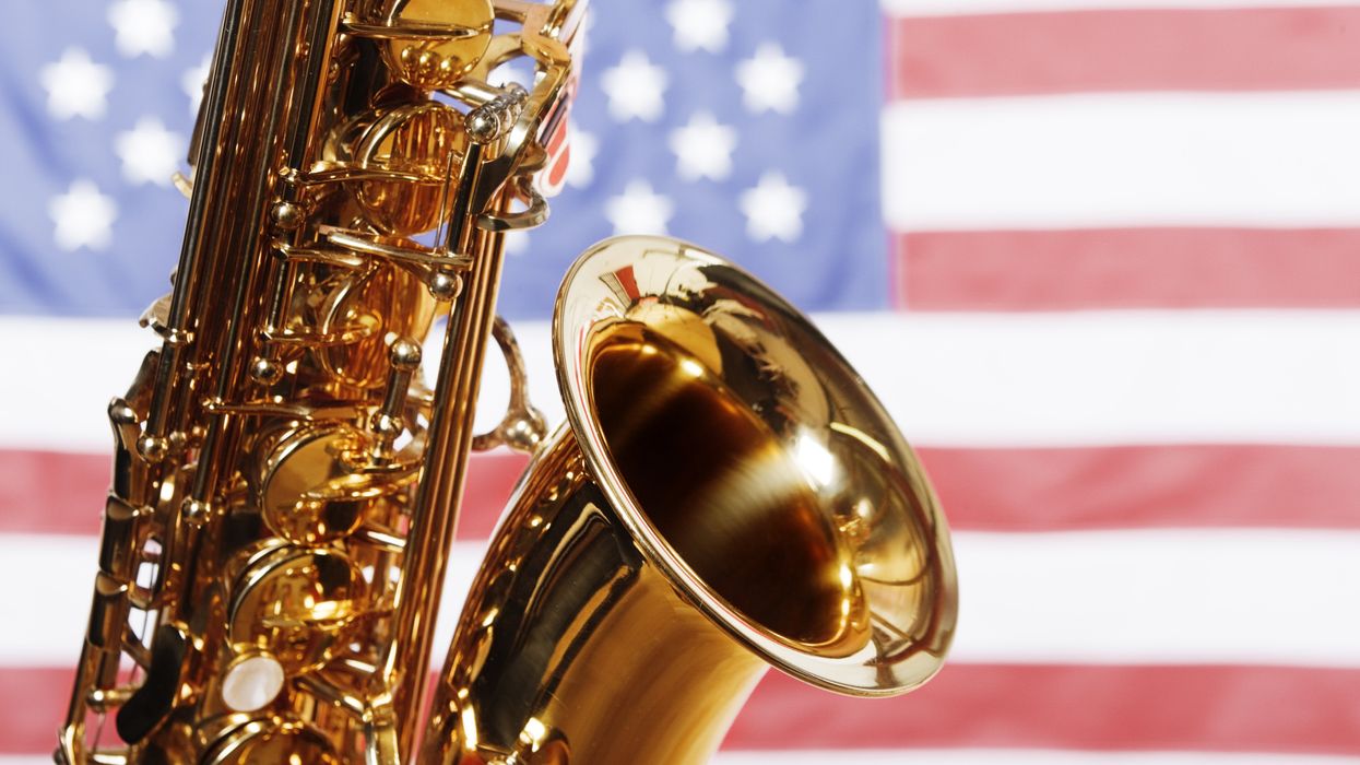 Saxophone over an American flag backdrop
