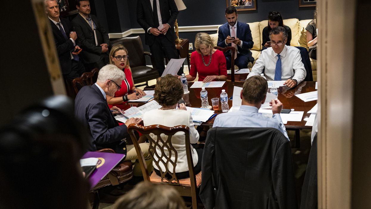 Senators in a meeting