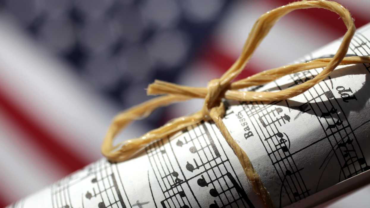 Sheet music in front of an American flag