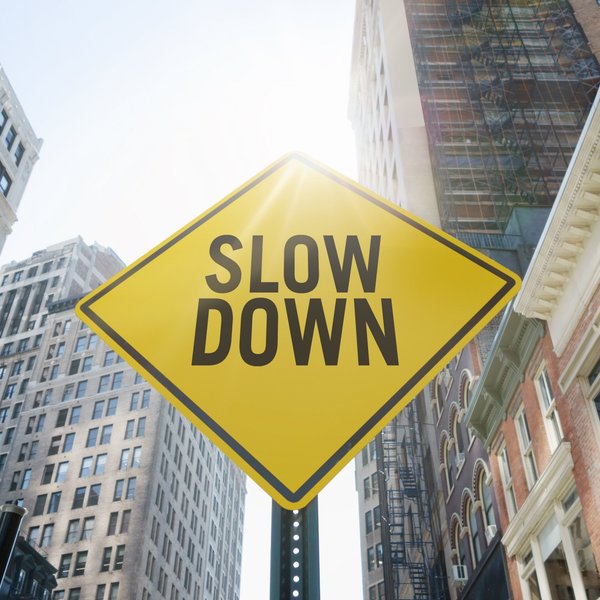 Sign saying "slow down"