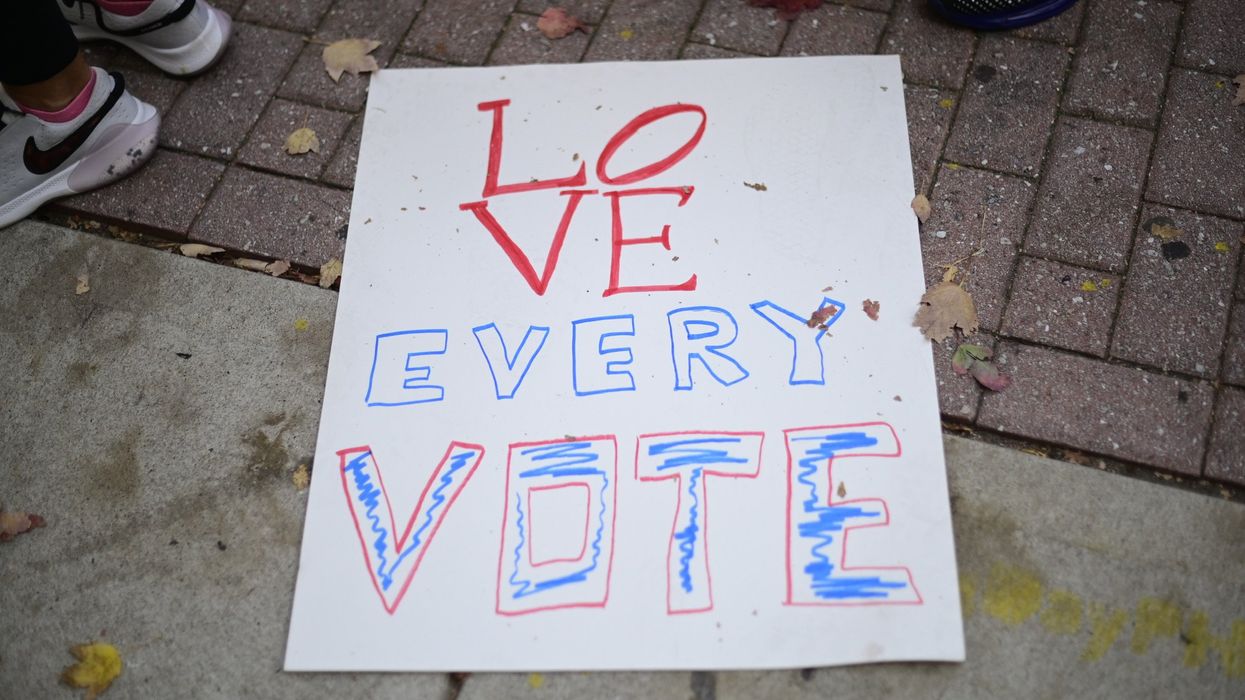 Sign that erads "LOVE every vote)