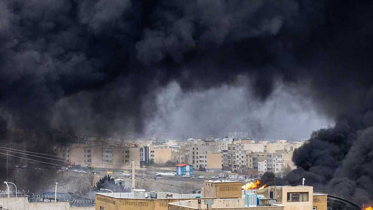 Smoke billows in Tehran, Iran.