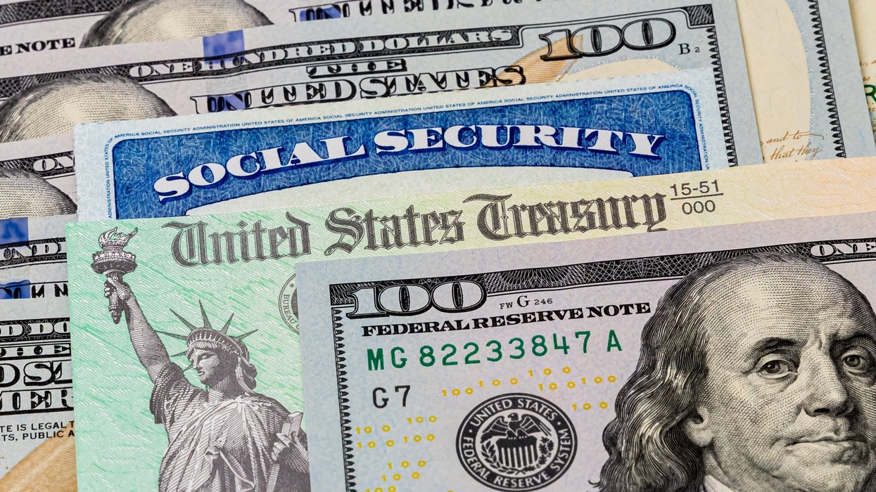 Social Security card, treasury check and $100 bills