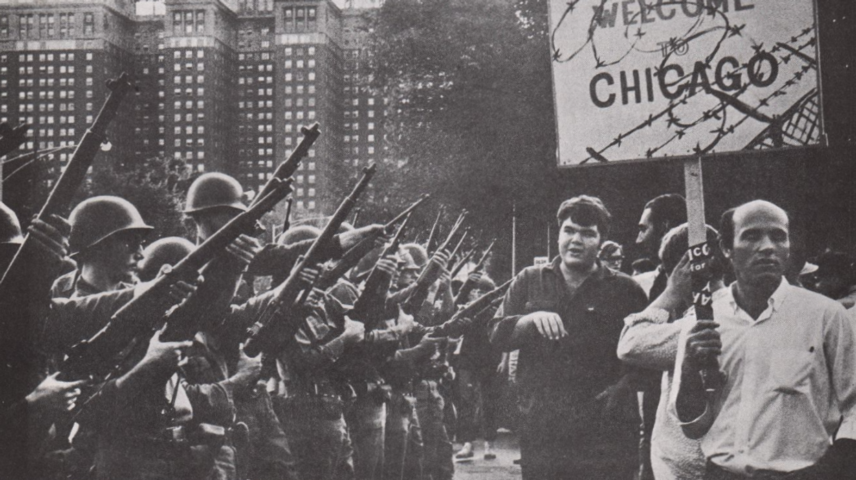 Soldiers watch protestors