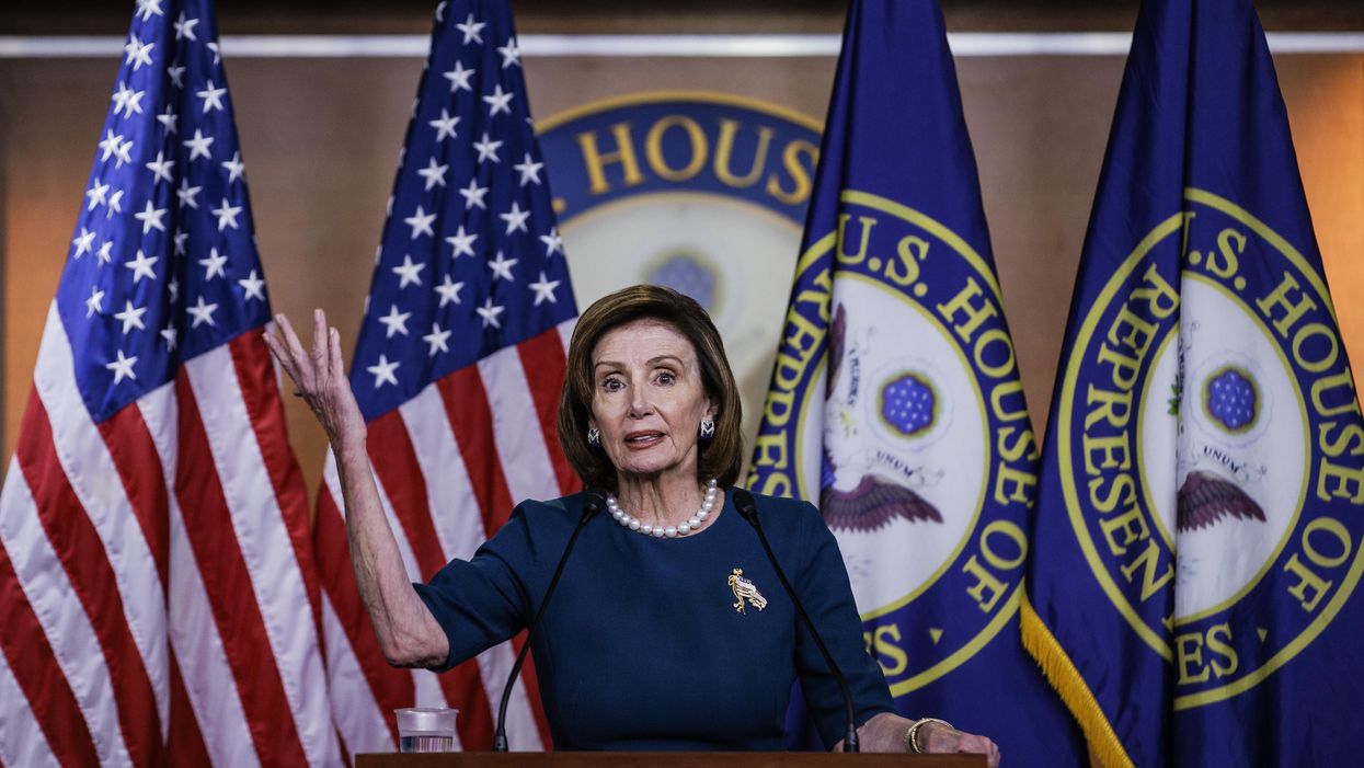 Speaker Nancy Pelosi at a podium