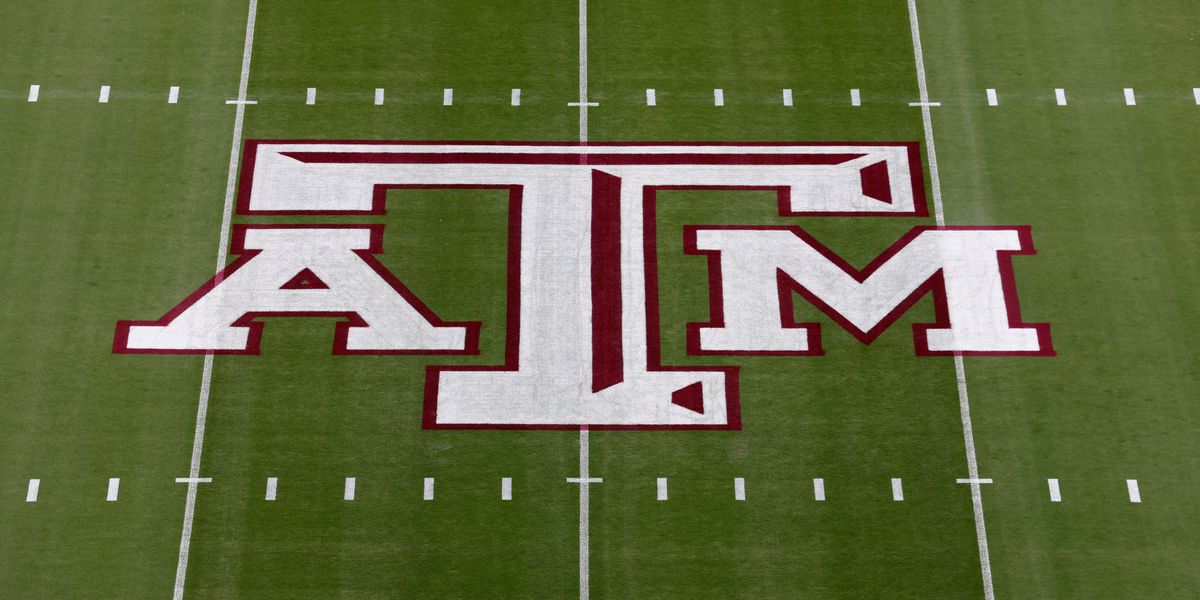 Texas A&M logo on the football field