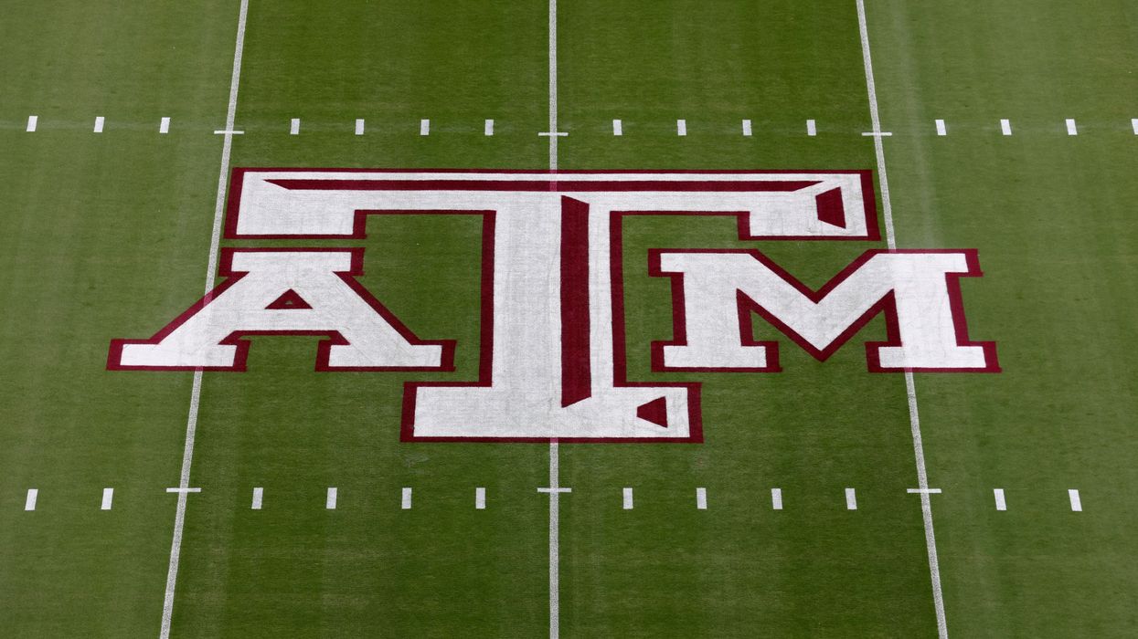 Texas A&M logo on the football field