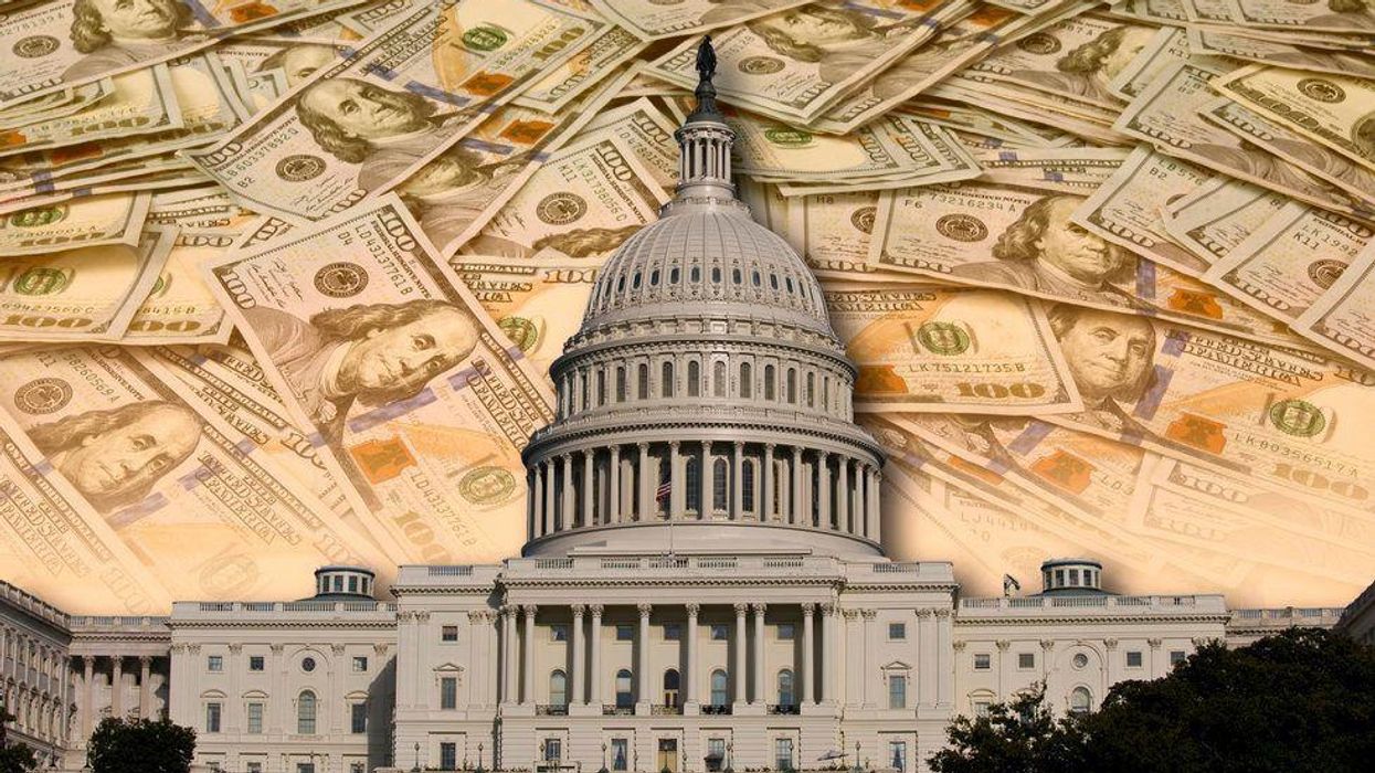 The Capitol on a background of U.S. currency