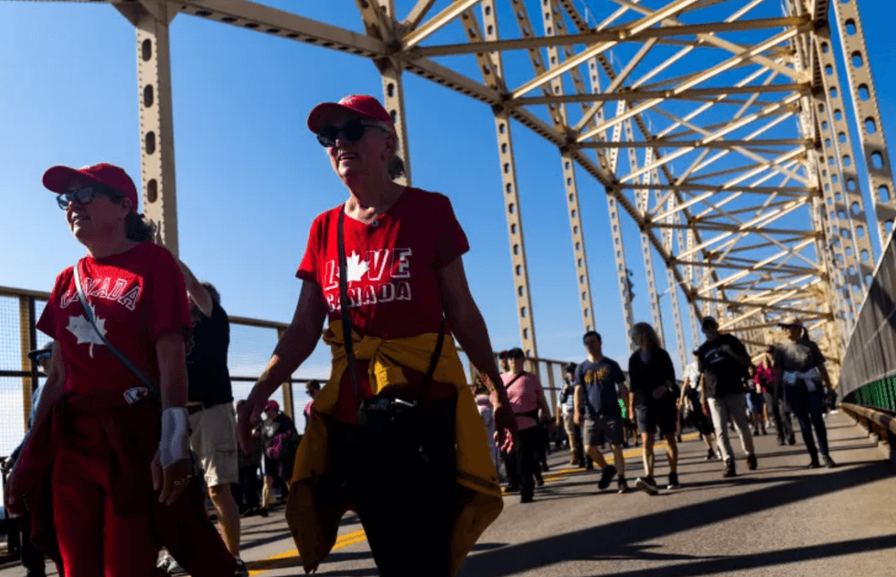 The cross-border bridge walk is supposed to represent unity among the twin communities, which locals refer to as one family