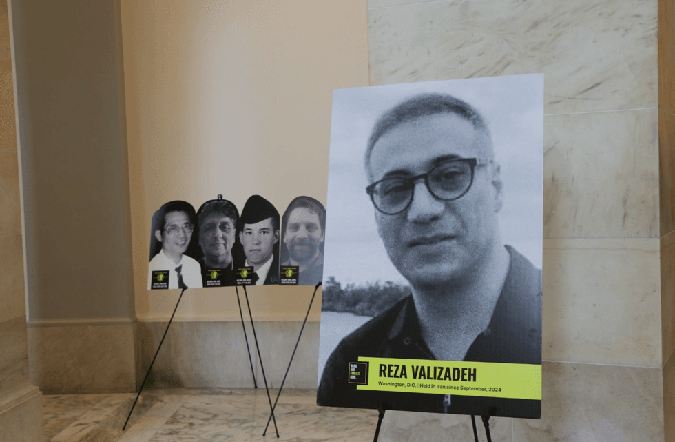 The portrait of Reza Valizadeh stands in the Senate Russell Rotunda