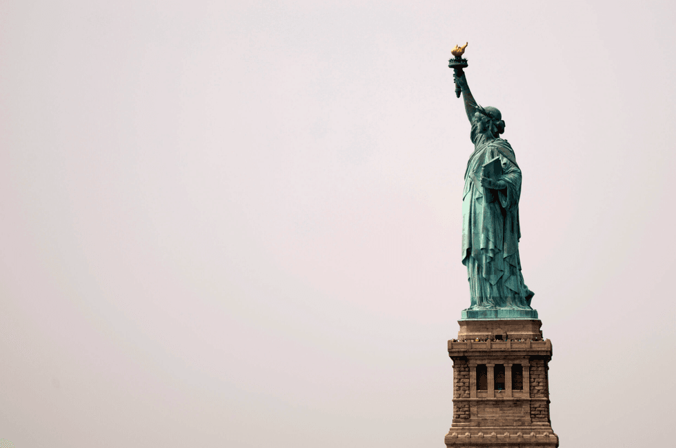 The Statue of Liberty looks out over New York Harbor