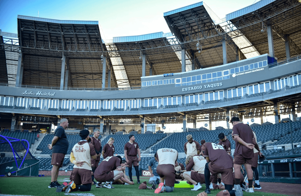 The Tucson baseball team during batting practice in Ciudad Obreg\u00f3n, Sonora. They were forced to play as the home team because most of their roster lacked U.S. visas. 