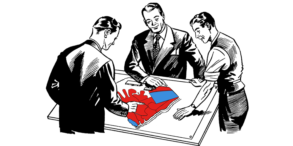 Three men consulting a map