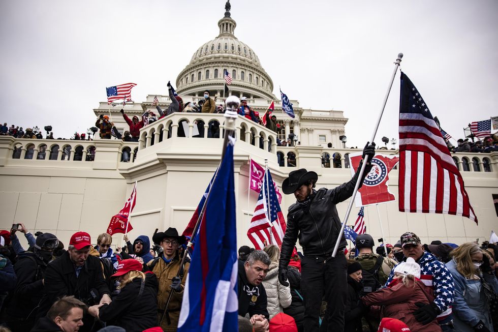 Trump supporters break through barriers and occupy the inauguration platform on the West Front of the Capitol