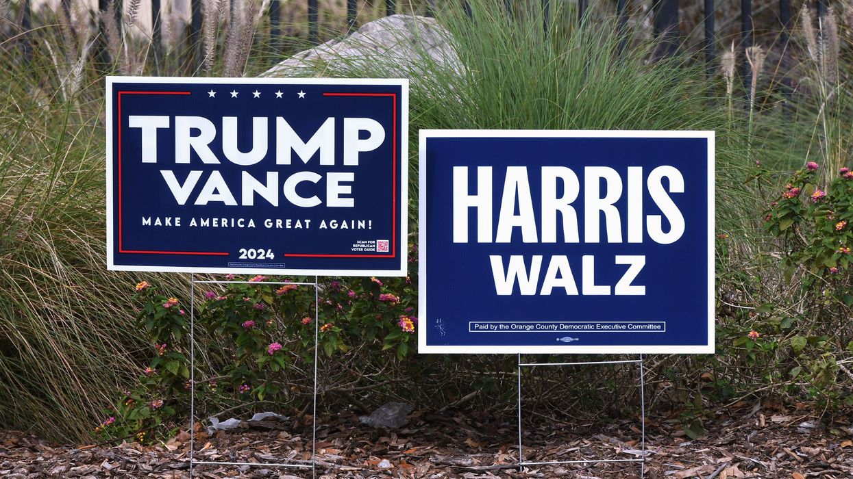 Trump-Vance and Harris-Walz campaign signs