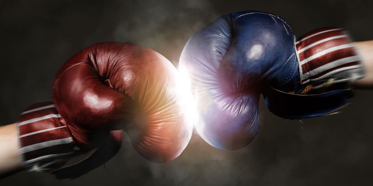 Two boxing gloves. One red and one blue.