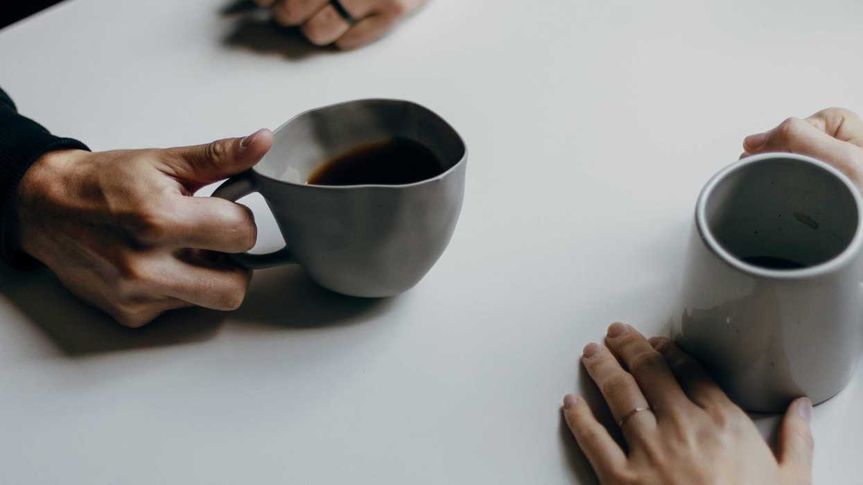two coffee cups on a table