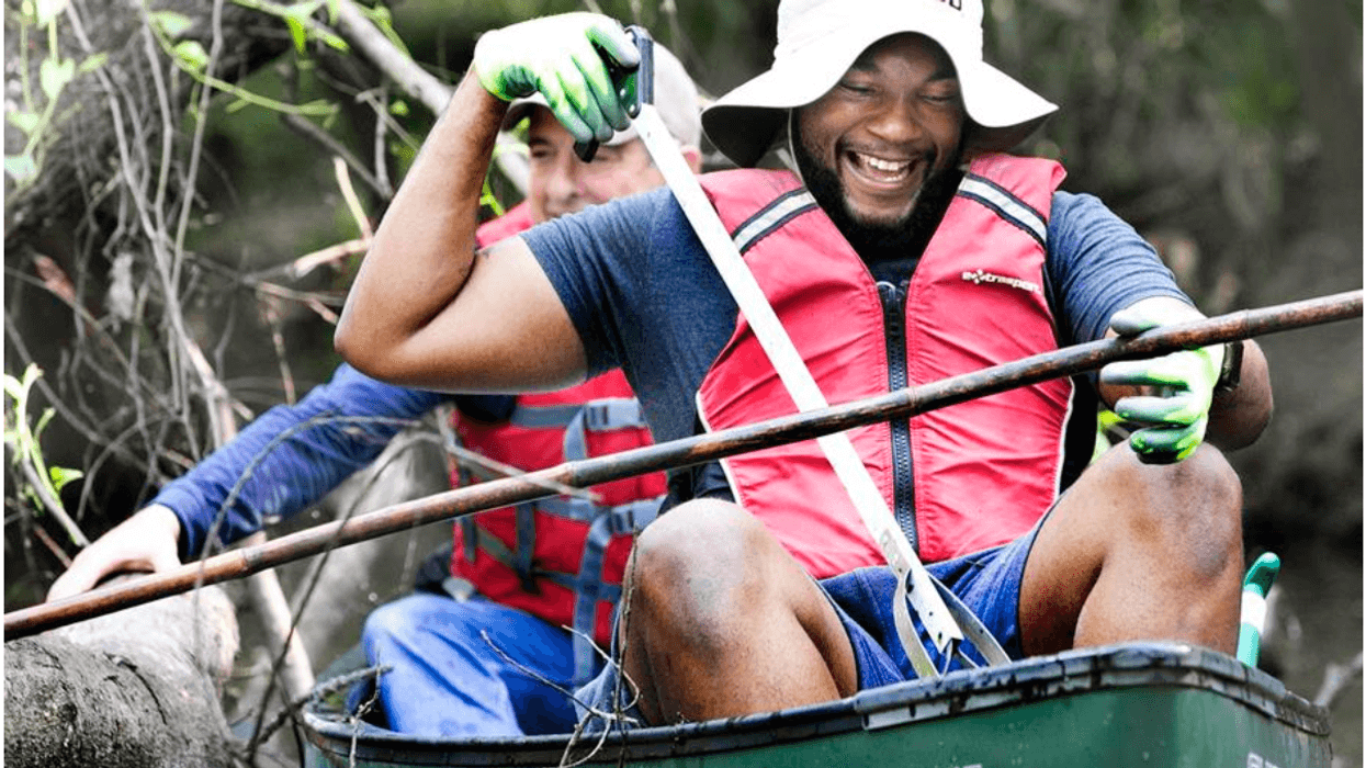 Two men in a small boat