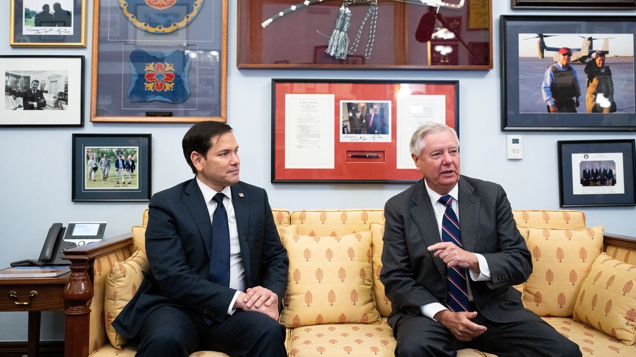 Two men sitting on a couch