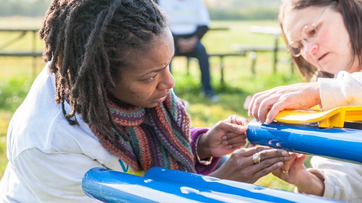 Two women working on a project together