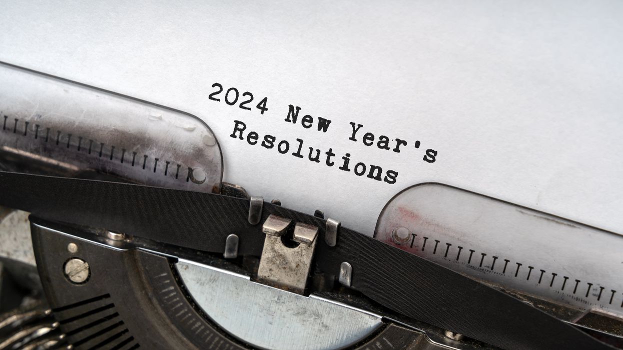 Typewriter with paper that reads "2024 New Year's Resolutions"