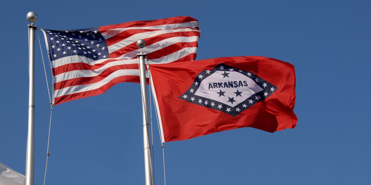 U.S. and Arkansas flags