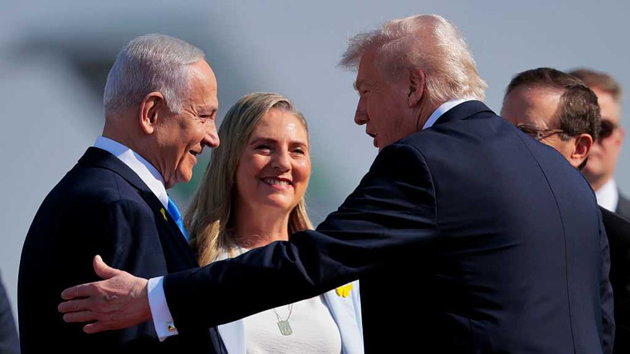 U.S. President Donald Trump greeting Israeli Prime Minister Benjamin Netanyahu.
