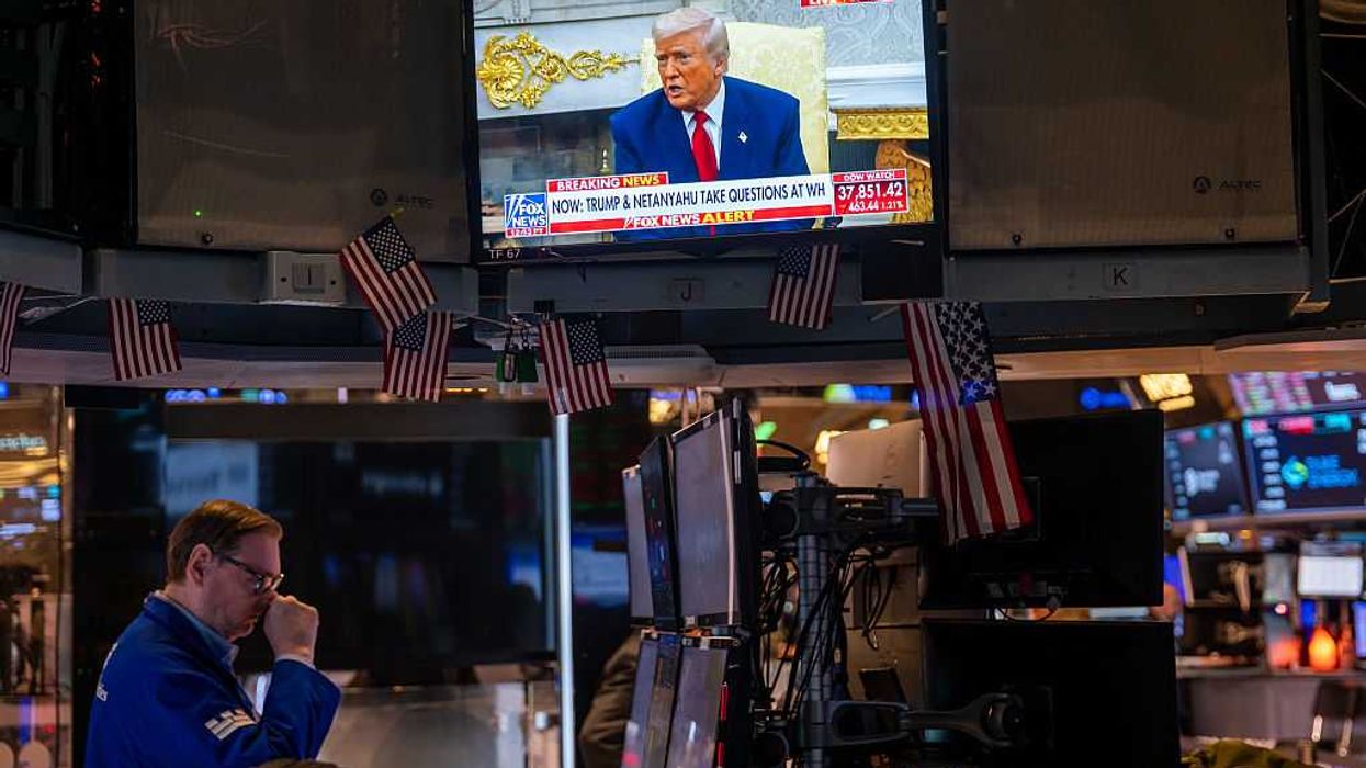 U.S. President Donald Trump is displayed on a television screen