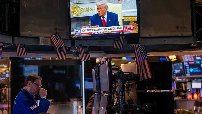 U.S. President Donald Trump is displayed on a television screen