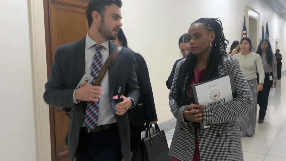 U.S. Rep. Summer Lee, D-Pa., speaks with reporters in the halls of the Capitol after she walked out of a congressional hearing